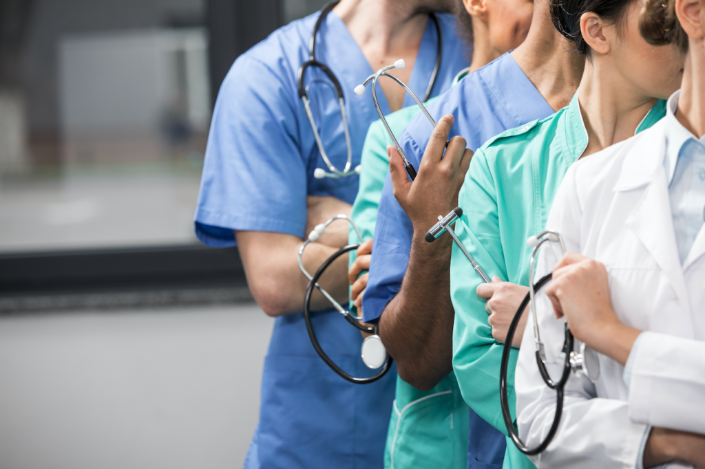 Healthcare professionals with stethoscopes